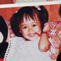 throwback photo of me grinning as a child